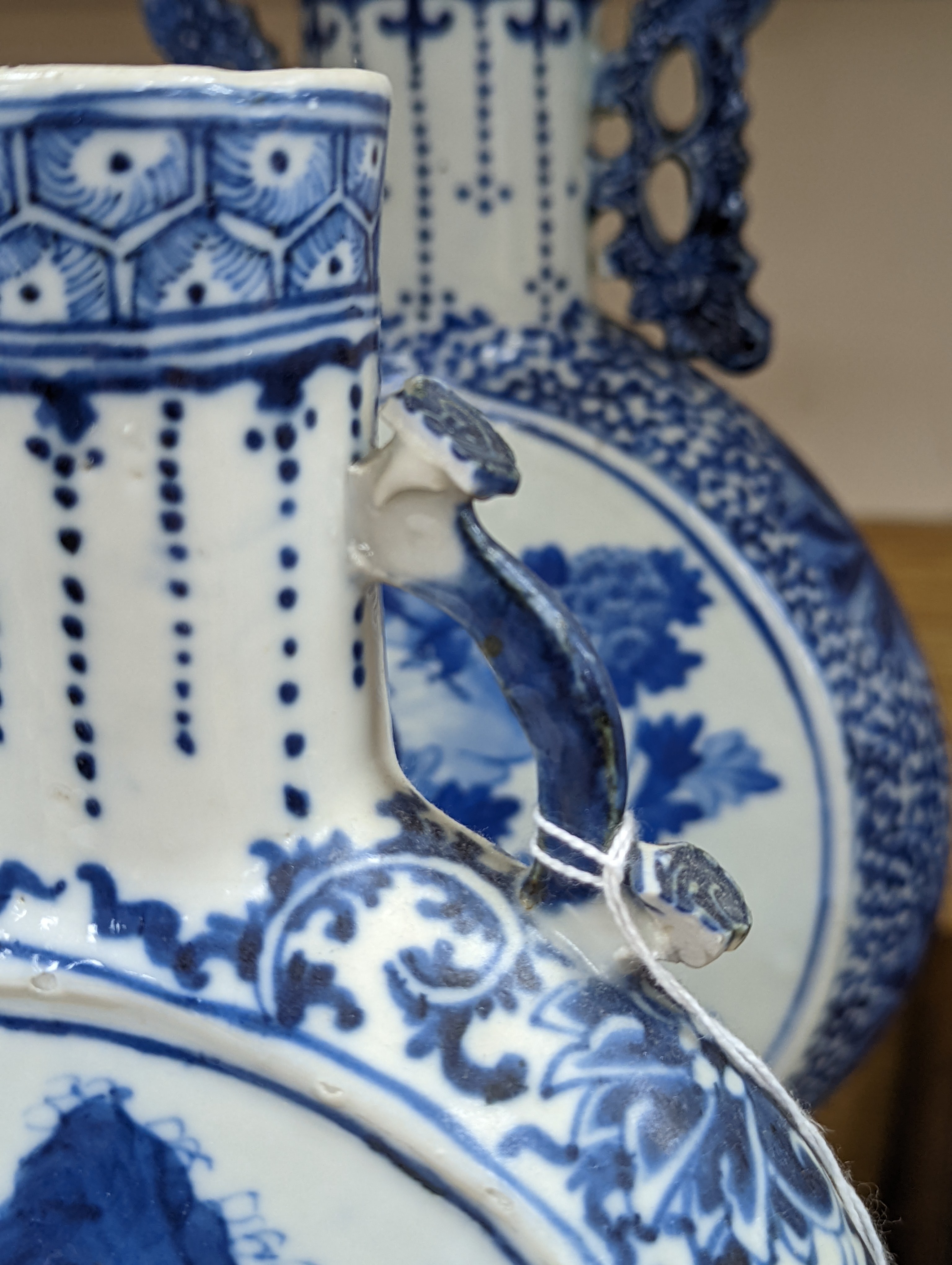 Three 19th century Chinese blue and white Moon flasks, tallest 31 cms.